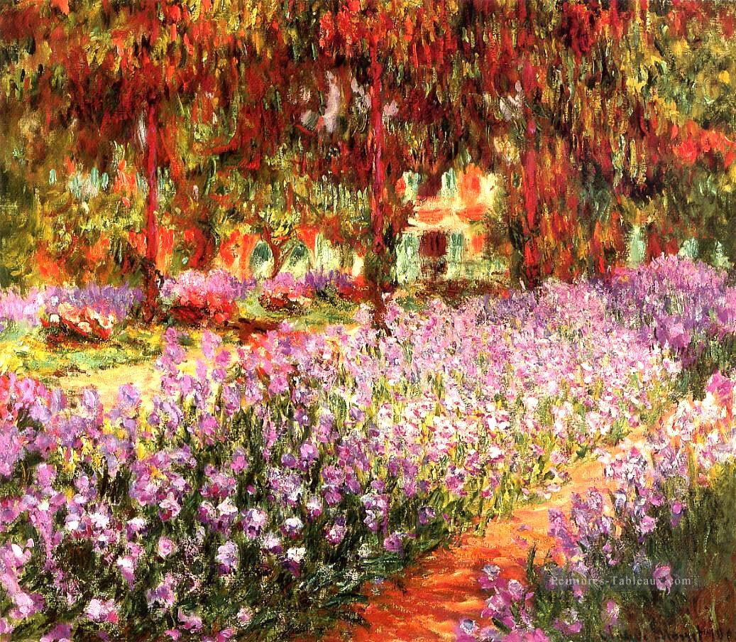 Le Jardin alias Iris Claude Monet Fleurs impressionnistes Peintures à l'huile